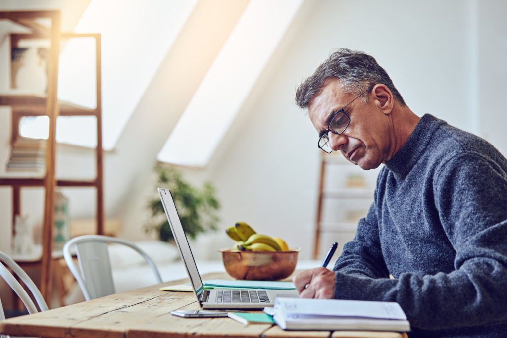 Remote Worker Using Laptop at Home